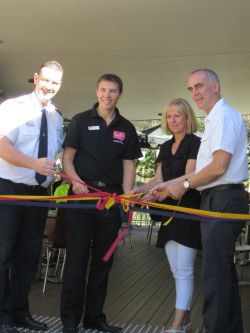 Divisional Commander Major Gavin Watts, cafe manager Richard Stark, Lake Macquarie Mayor, Cr Greg Piper and his wife Lyn untie the ceremonial ribbon.