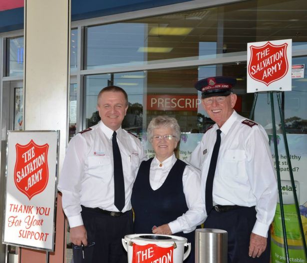 A family affair – retired Majors Hilton and Joyce Harmer with son Bruce collect in Caringbah, south Sydney.